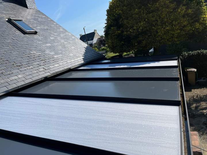 Remplacement des panneaux et de la structure de toiture de votre véranda